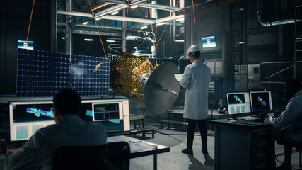 Industrial Engineer Working on Artificial Satellite Construction. Aerospace Agency: Scientist in...