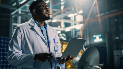 Industrial Engineer Working on Artificial Satellite Construction. Aerospace Agency: African...