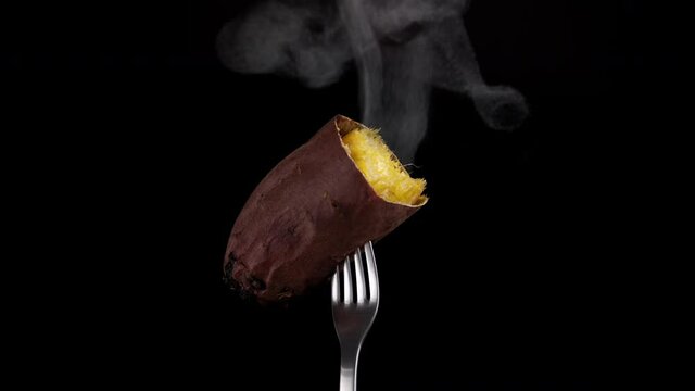 Video of a hot baked sweet potato stuck in a fork.
Cinema graphs.