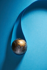 Ecology and Pollution Concept : Blue planet earth globe in water drop with blue background
