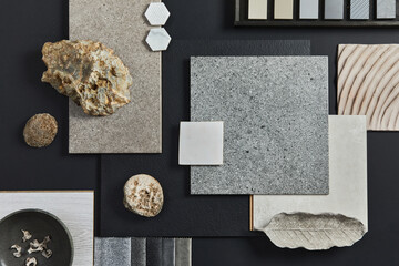 Flat lay of creative architect moodboard composition with samples of building, textile and natural materials and personal accessories. Top view, black backgroung, template. - obrazy, fototapety, plakaty