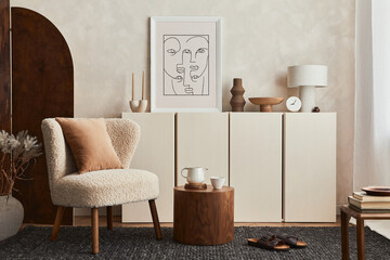 Stylish composition of cozy living room interior design with mock up poster frame, fluffy armchair,...