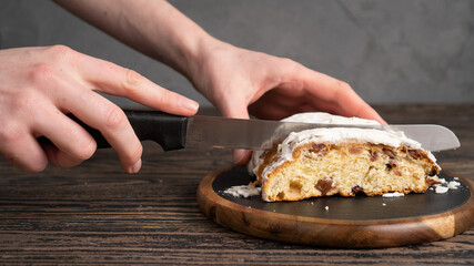 Stollen delicious yeasted cake filled with dried fruit and a swirl of marzipan. Traditional German fruitcake