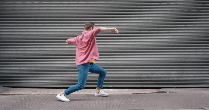dance loop funny man dancing in street having fun celebrating with funky looping dance 4k