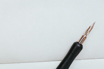 Top view closeup ink pen for lettering and planl pages of diary or notebook. Copy space, empty space for text, education concept.