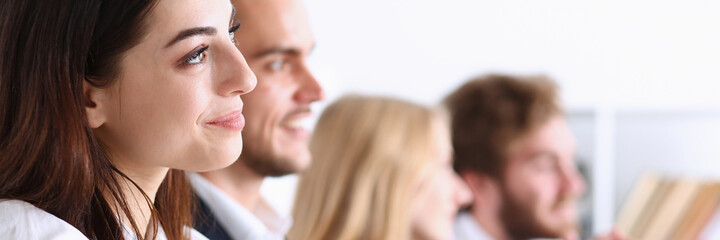 A group of people at the seminar applauded the lecturer in the palm of their hand