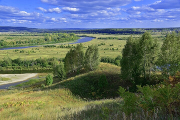 Fototapeta na wymiar The wide valley of the Ural river Sylva