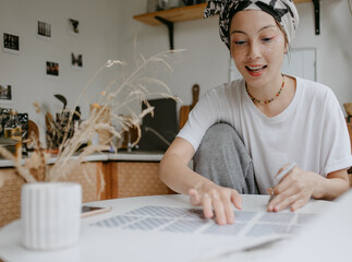 woman with tarot cards on the white kitchen