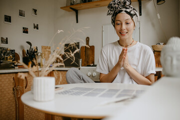 woman with tarot cards on the white kitchen