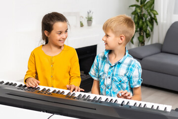 synthesizer, kids have activity at home. Hobby
