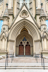 Fototapeta na wymiar Entrance door to colonial Saint James Cathedral in Toronto, Canada