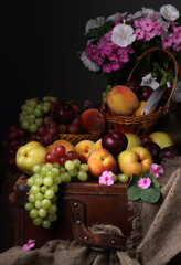 Still life with flowers and fruits in the style of old Dutch artists