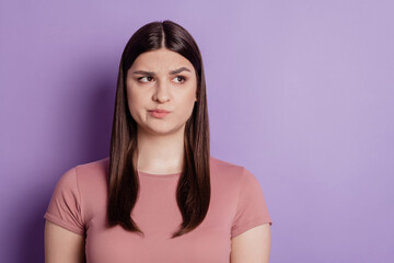 Fototapeta premium Portrait of young beautiful cute girl look empty space think thoughtful isolated on violet color background