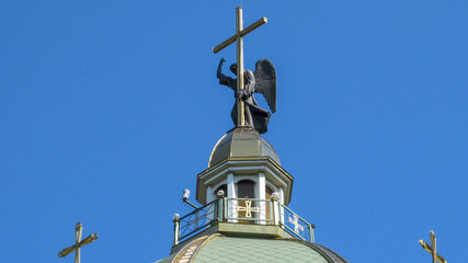 Sculpture of an angel with a cross on the dome of the Ukrainian Greek Catholic Church in Ternopil