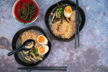 Ramen noodles in soy, shiitake and kombu broth with pickled egg