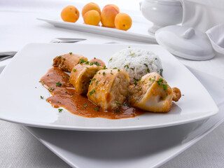 Calamar relleno con arroz blanco. Stuffed squid with white rice.