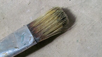 Old paintbrush for painting in the workshop