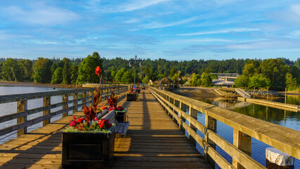 Boat-launch ramp at Rocky Point Park, Port Moody, as viewed from pier  decorated with Amaryllis...