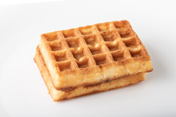 Soft Belgian waffles on a white background.