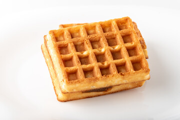 Soft Belgian waffles on a white background.