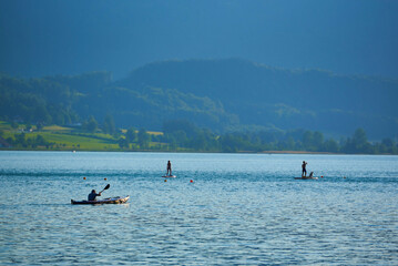 Fisherman on Lake Wolfgang. Austrian Alps, Salzburg region.