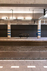 An empty bench on one of the platforms of Station Rijswijk (The Netherlands)