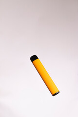 Yellow disposable salt vape with white background