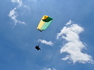 Medellin, Colombia - 20.05.2015: Paraglider flying above Medellin