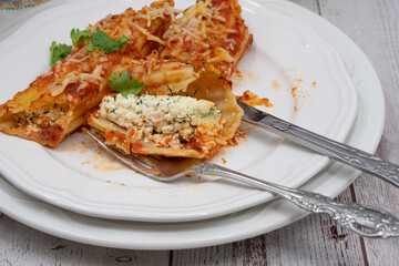 Vegetarian manicotti filled with cottage cheese, dill