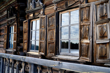 Windows of an old traditional Russian wooden house on the Kizhi island in Karelia, Russia.