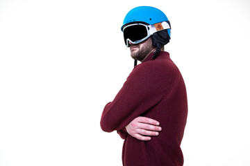 Portrait of a brutal man in a ski helmet and glasses