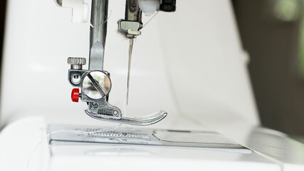 sewing machine foot and item of clothing