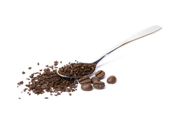 Instant coffee powder in steel spoon with roasted coffe beans isolated on white background.