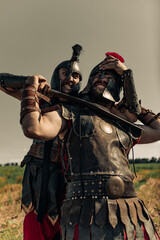 Battle with swords between two ancient warriors.