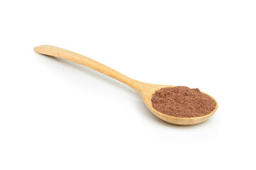 Cocoa powder in wooden spoon isolated on white background. T