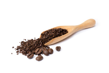 Instant granulated coffee in wooden spoon with roasted coffe beans isolated on white background.