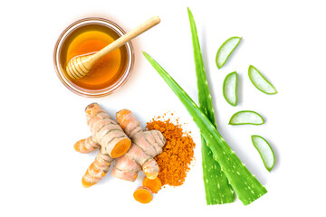 Homemade natural skincare product with aloe vera plant, turmeric and honey isolated on white background. Top view. Flat lay.