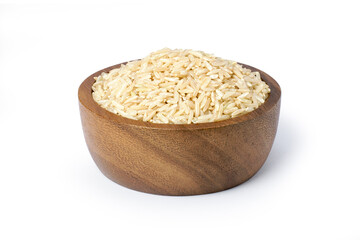 Coarse brown rice in wooden bowl isolated on white background. Clipping path.