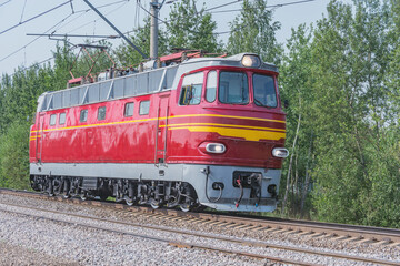 Fototapeta premium Passenger retro electric czech locomotive departs.