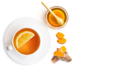 Cup of turmeric tea on a white background