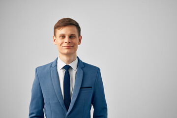Cheerful business man in suit official office work posing