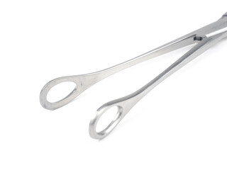 steel surgical clamp on white background