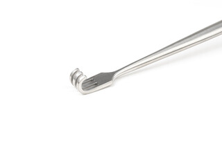 steel surgical curettages on a white background