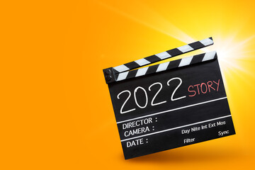 2022 story. handwriting on film slate or movie clapboard.Happy new year film industry.