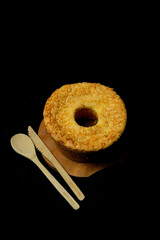 cheese chiffon cake on black background