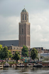 Fototapeta premium Zwolle, The Netherlands, August 20, 2021: the iconic Peperbus (Pepper can) tower rising above the houses and other buildings of the old town