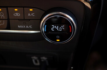 Fototapeta premium A car's air conditioning display marks 24 degrees
