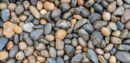 Beach pebble stone background that is popular to decorate the garden for beauty