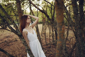 pretty woman in white dress forest nature walk vacation