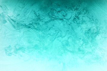 Abstract blue-green ocean, paint in water background. swirl of splashes and waves in motion. Fluid art wallpaper, liquid vibrant colors